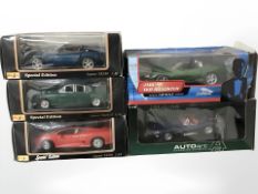 Three Maisto 1:18 scale die cast model vehicles,