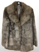 A lady's brown mink fur coat.