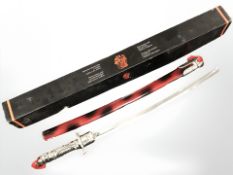 A Denix replica Eastern sword with die cast metal mounts, length 86 cm.