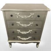 A silvered-finish four drawer chest, 79 cm x 40 cm x 100 cm.