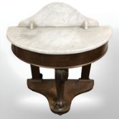 A Victorian mahogany white marble topped demi-lune wash stand, width 92 cm.