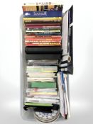 A small quantity of books and annuals, craft paper, Masons blue and white collectors plates.