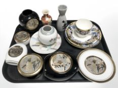 A group of black and white ground Chokin ware ceramics,