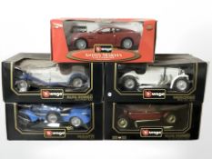 Five Burago 1:18 scale die cast model vehicles in boxes.