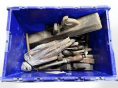 A wooden block plane, carpentry chisels and similar hand tools.