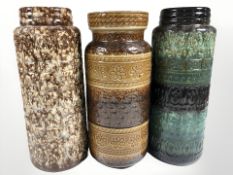 Three West German pottery stick pots, height 40.