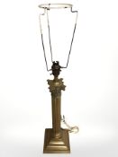 An Edwardian brass Corinthian column lamp base, height 46 cm up to fitting.