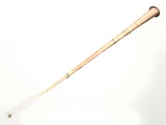 A large Eastern copper and brass horn, length 158 cm.