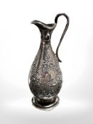 A miniature silver ewer by Walker & Hall, Sheffield marks, height 8.5 cm.