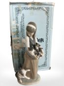 A boxed Lladro figure of a girl and cats, No. 1309, height 24 cm.