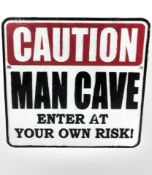 A caution man cave plaque.
