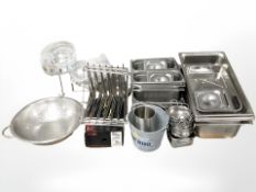 A quantity of commercial stainless steel catering items : bain marie, bowls, serving dishes,