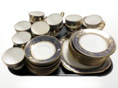 Thirty eight pieces of New Chelsea Staffordshire gilded tea china.