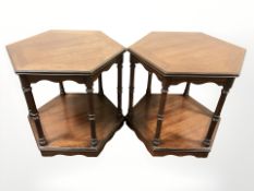 A pair of reproduction mahogany hexagonal shaped occasional tables,