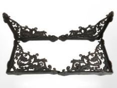 Two pairs of cast wall brackets.