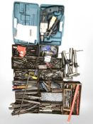 A quantity of metal drawers containing tools, spanners, lathe tools, nuts, bolts, socket sets,