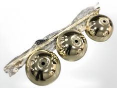 A brass three shade bar light