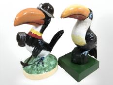 Two metal toucan figures.
