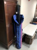 A Leeda blue diamond fishing bag containing various rods, a reel, an Abu Garcia reel,