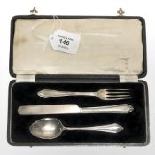 A silver fork, spoon and knife in fitted case, Birmingham, 1933.