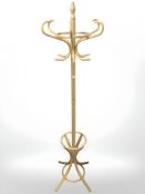 A beech hat and coat stand