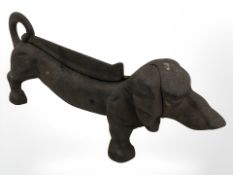 A cast iron figure of a dachshund,