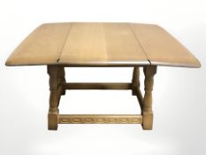 An Ercol low occasional table, width 68 cm.