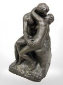 A contemporary bronze effect figure depicting lovers on wooden plinth, height 30 cm.