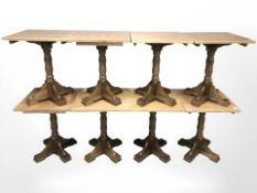Eight square pub tables on oak bases
