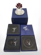 A group of Swarovski crystal figures and ornaments.