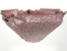 An Art Deco pink and white glass light shade.