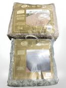 A quilted bed throw, 230 cm x 220 cm, together with a further quilted throw, 240 cm x 260 cm.