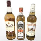Three bottles of scotch whisky to include Bell's finest eight year old scotch, 1L,