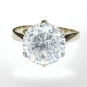A 9ct yellow gold synthetic solitaire ring, size H/I. CONDITION REPORT: 2.9g.