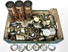 A large quantity of British stamps, contained in tins.