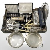A box containing a large quantity of silver plated cutlery, carving set, cased cutlery, etc.