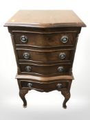 A reproduction mahogany low boy chest of drawers,