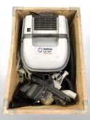 A Nilfisk UZ934 vacuum cleaner.