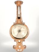 A 19th century rosewood barometer, inlaid with mother of pearl.