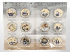 A set of 24ct gold plated D-day commemoration coins issued by Koin limited.