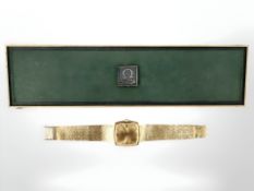 An 18ct yellow gold Gentleman's Omega De Ville wristwatch, with square gold coloured sun-ray dial,