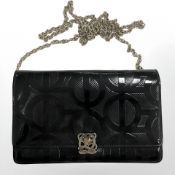 A Louis Quatorze lady's black laminate handbag with chain.