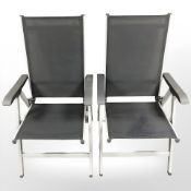 A pair of folding garden armchairs, width 60 cm.