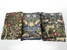A group of Morris & Co. bedding and pillow cases.
