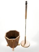 A teak octagonal waste paper bin,