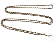 A 9ct yellow gold muff chain, length approximately 150 cm. CONDITION REPORT: 61.5g.