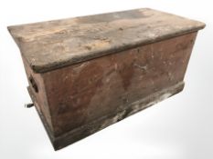 An antique pine blanket box