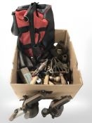 A box of tools, metal irons, hand tools, two blow lamps, etc.