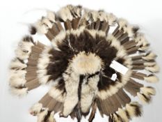 A Native American Brown Prairie Fur and Feather Headdress,