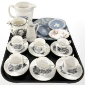 A set of six Royal Chelsea 'The Vagrant' gilded coffee cans and saucers,